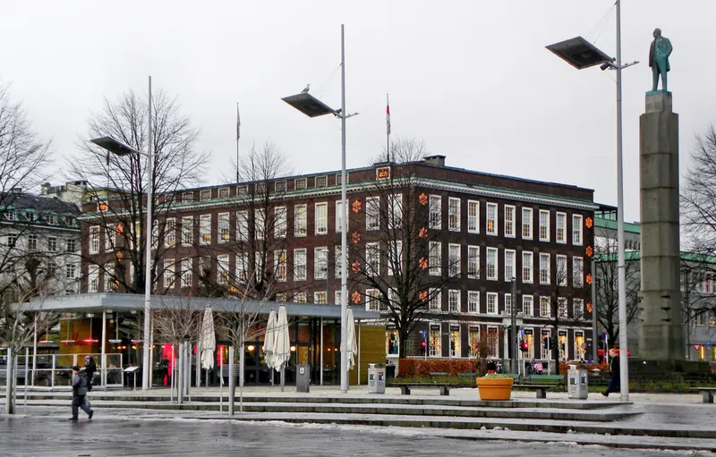 Festplassen in Bergen in December, with Christmas lights on Telegrafbygningen — the square that hosts Bergen julemarked