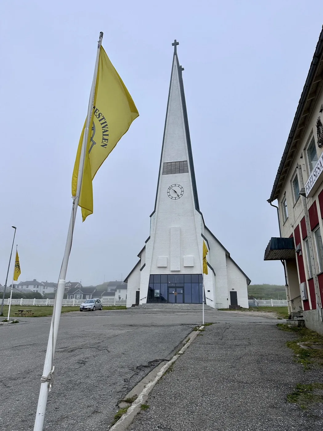 Festival flags by the church in Vardø during the Pomor Festival.